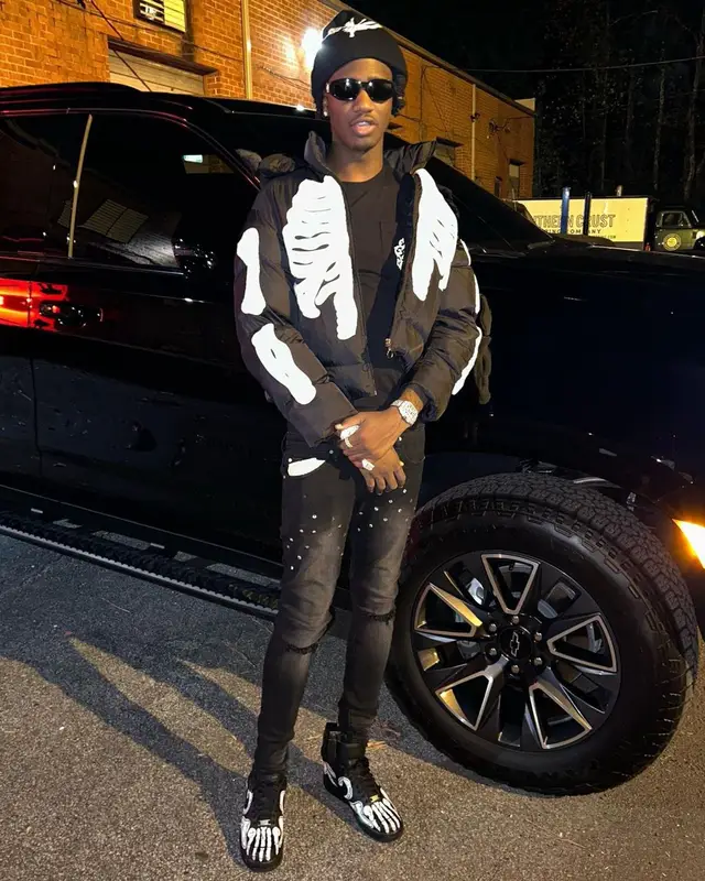Yung Mal outfit in Chrome Hearts, Versace, and Don Honcho, 2022