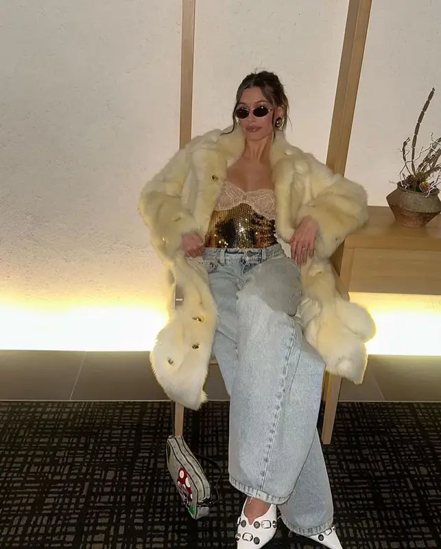 Hailey Bieber outfit in Bottega Veneta, Dolce & Gabbana, and Louis Vuitton, 2022