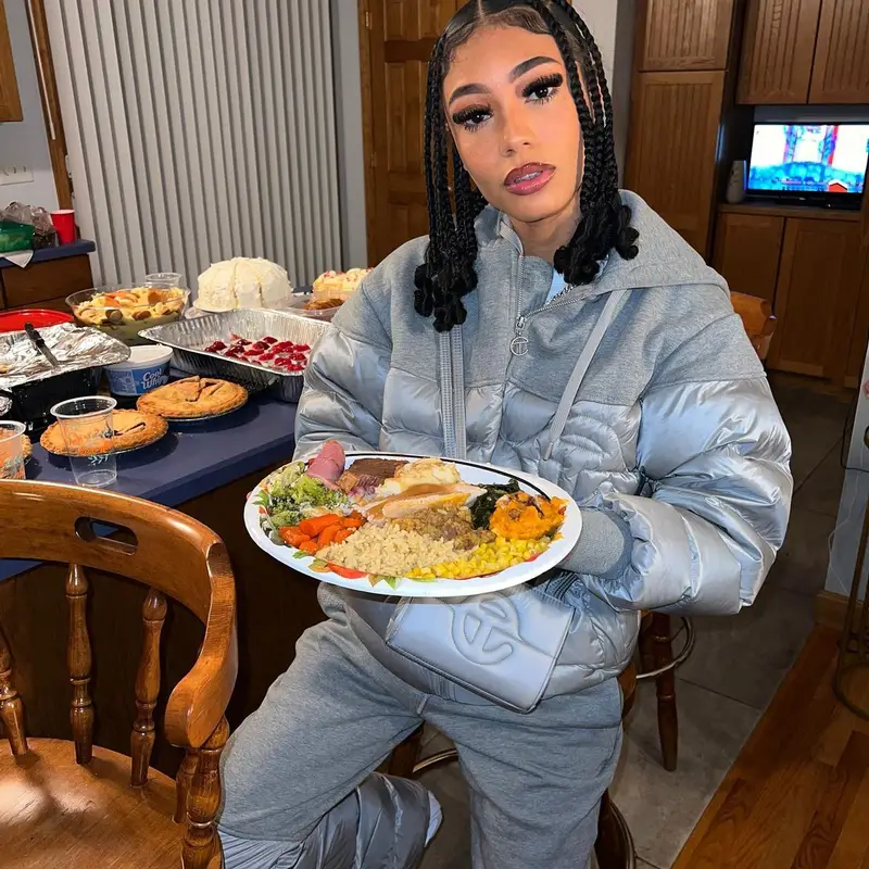 Coi Leray outfit in Telfar, Nike, and Drake Merch, 2022