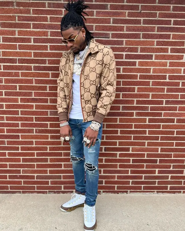 CJ So Cool outfit in Gucci, Amiri, and Louis Vuitton, 2022