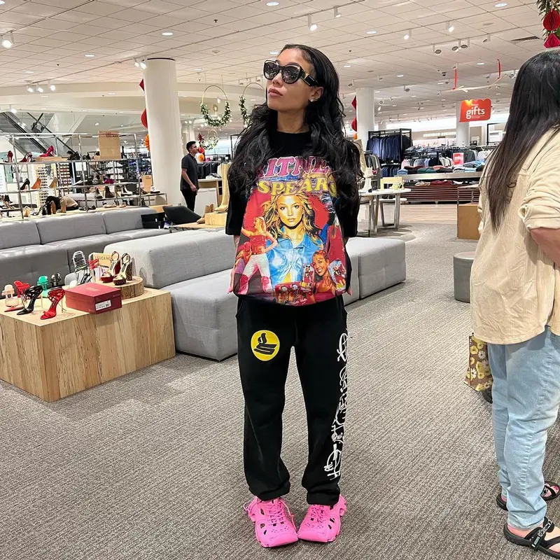 Coi Leray outfit in Born From Pain, Balenciaga, and Louis Vuitton, 2022