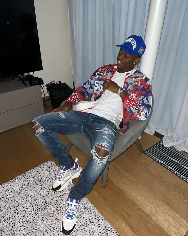 Rafael Leao outfit in Supreme, Amiri, and Goyard, 2022