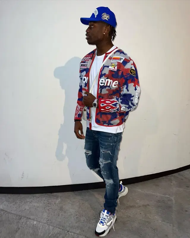 Rafael Leao outfit in Supreme, Amiri, and Goyard, 2022