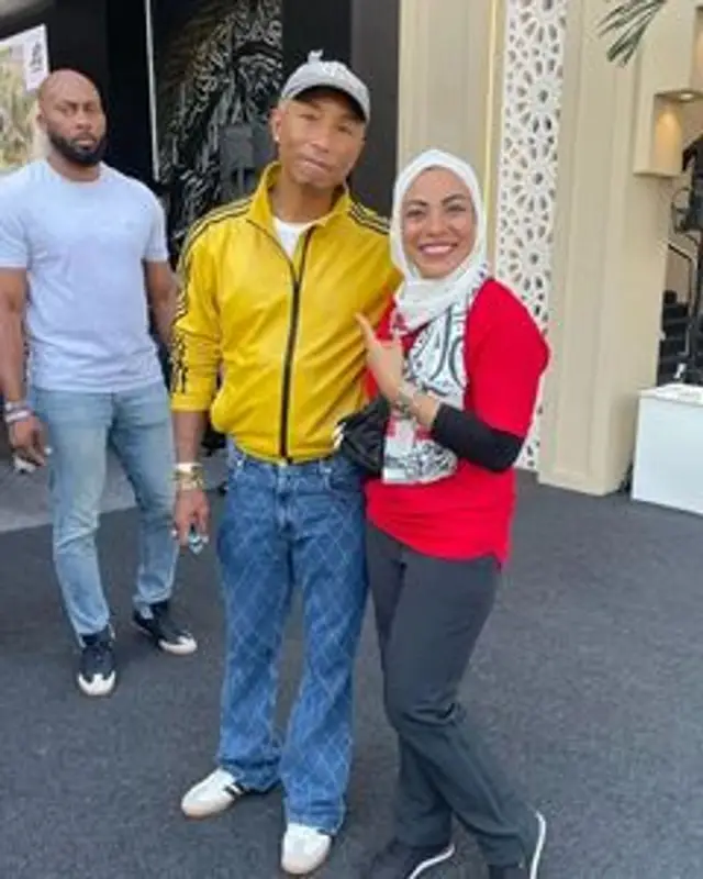 Pharrell Williams outfit in Adidas, Human Made, and Girls Don't Cry, 2022