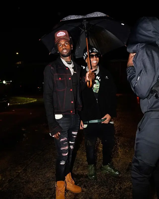 Lil Gotit outfit in Bape, Dior, and Palm Angels, 2022