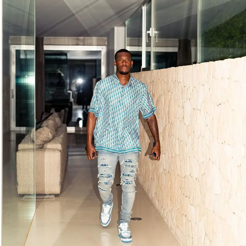 Callum Hudson-Odoi outfit in Dior, Amiri, and Louis Vuitton, 2022