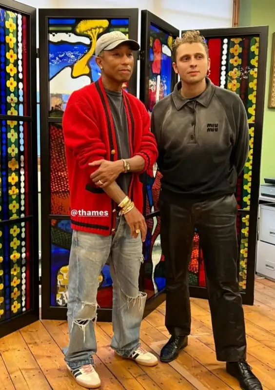 Pharrell Williams outfit in Celine, Human Made, and Girls Don't Cry, 2022