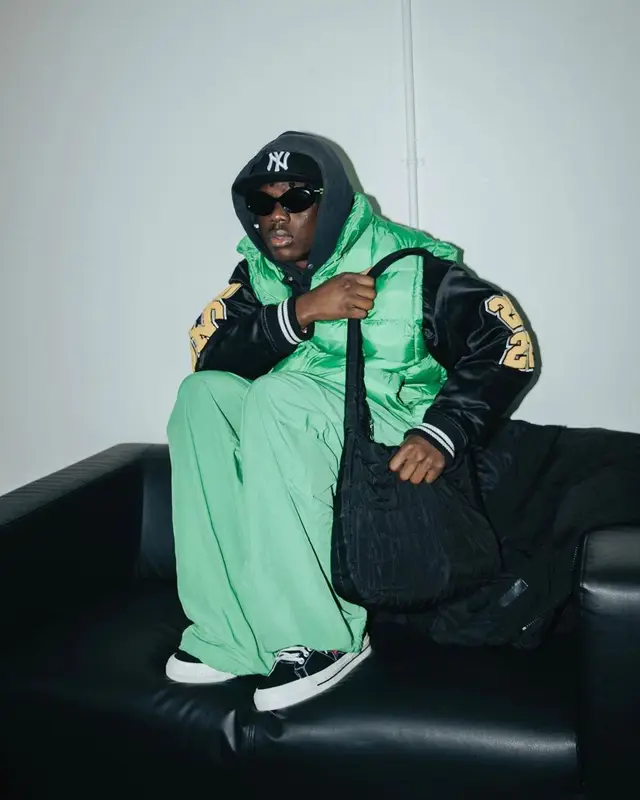 Rema outfit in Converse, New Era, and Calvin Klein, 2022