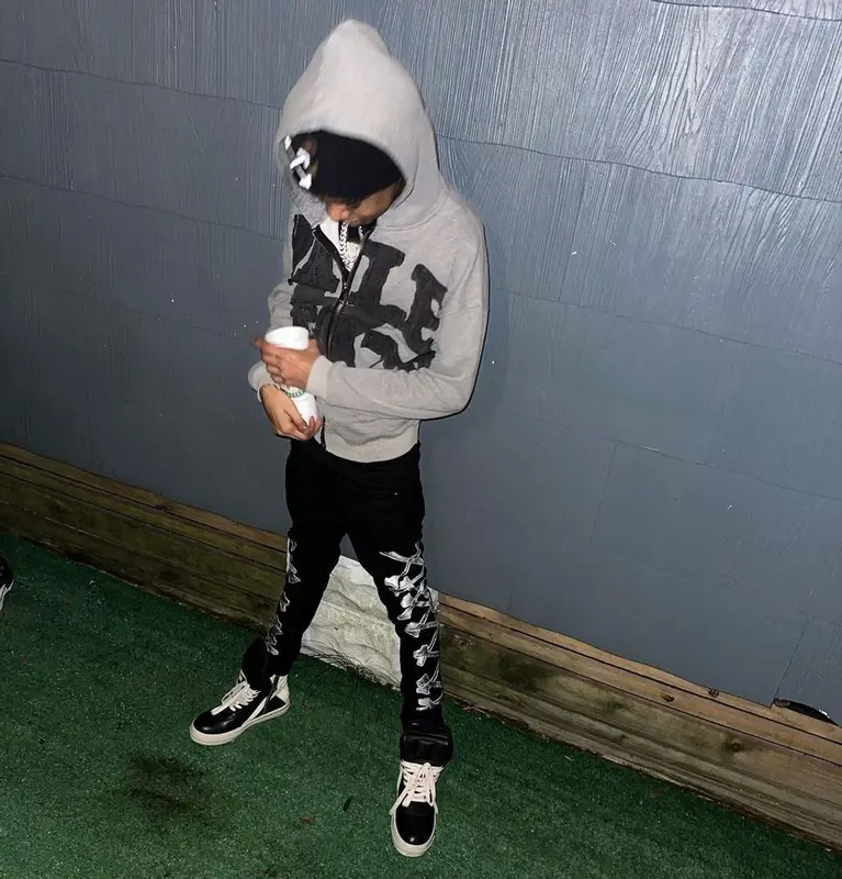 Lil Poppa outfit in Amiri, Rick Owens, and Off-White, 2022