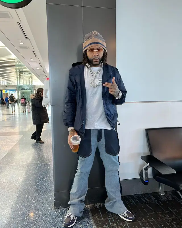 Money Man outfit in Louis Vuitton, Monfrere, and Gucci, 2022