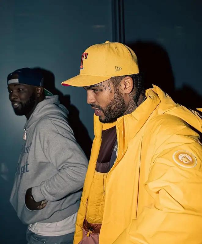 Dave East outfit in Kith, Who Decides War, and New Era, 2022