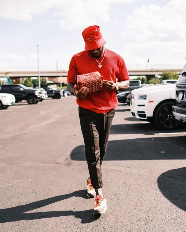 Kareem Jackson outfit in Nike, Prada, and Travis Scott Merch, 2022