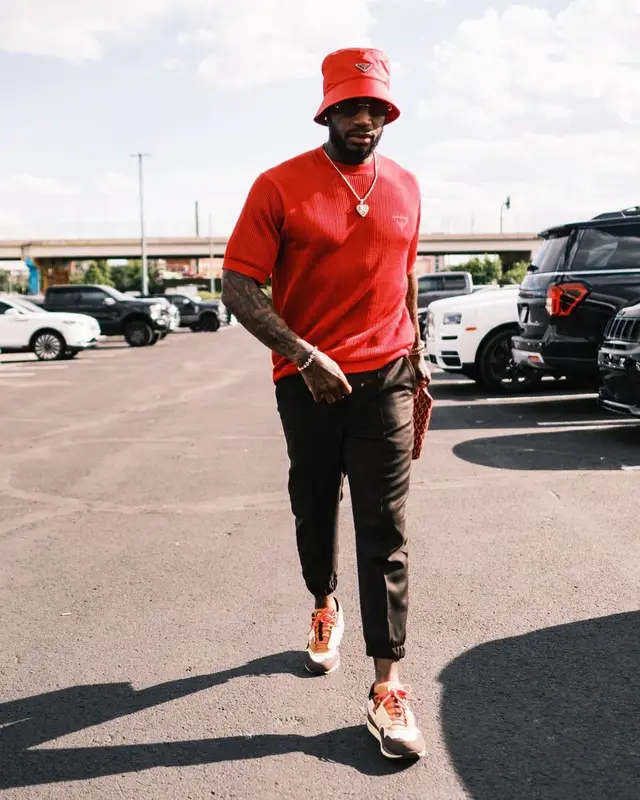 Kareem Jackson outfit in Nike, Prada, and Travis Scott Merch, 2022