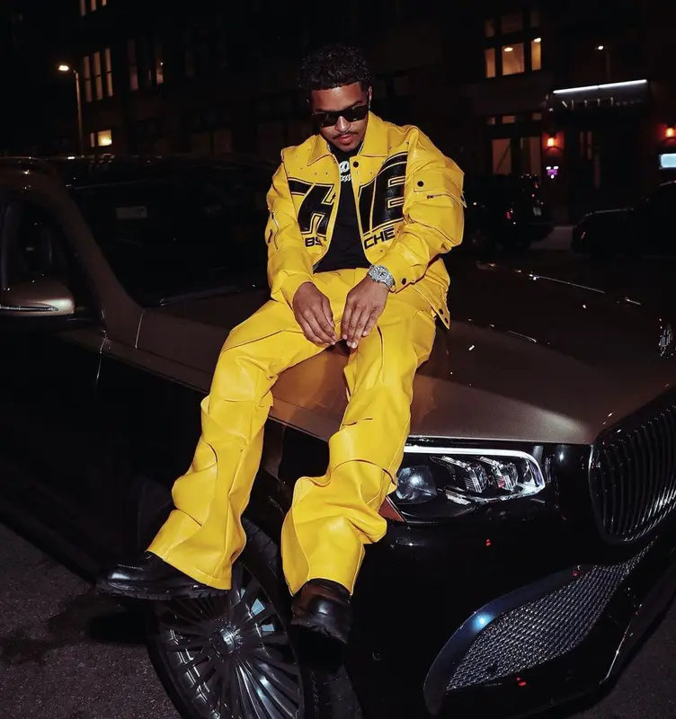 Justin Dior Combs outfit in Che By Che and Retrosuperfuture, 2022