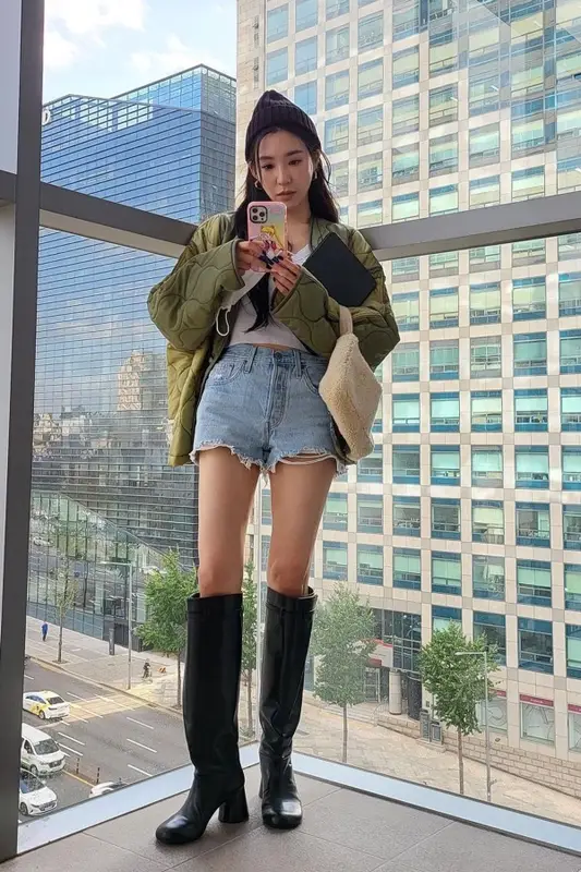 Tiffany Young outfit in Khaite, Prada, and Casetify, 2022