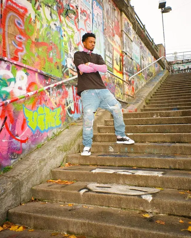 Pierre Bourne outfit in Heron Preston, Kapital, and Maison Mihara Yasuhiro, 2022