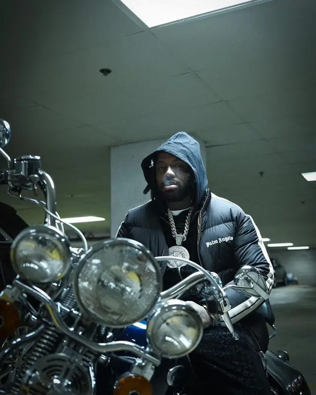 EST Gee outfit in Moncler, Supreme, and Palm Angels, 2022
