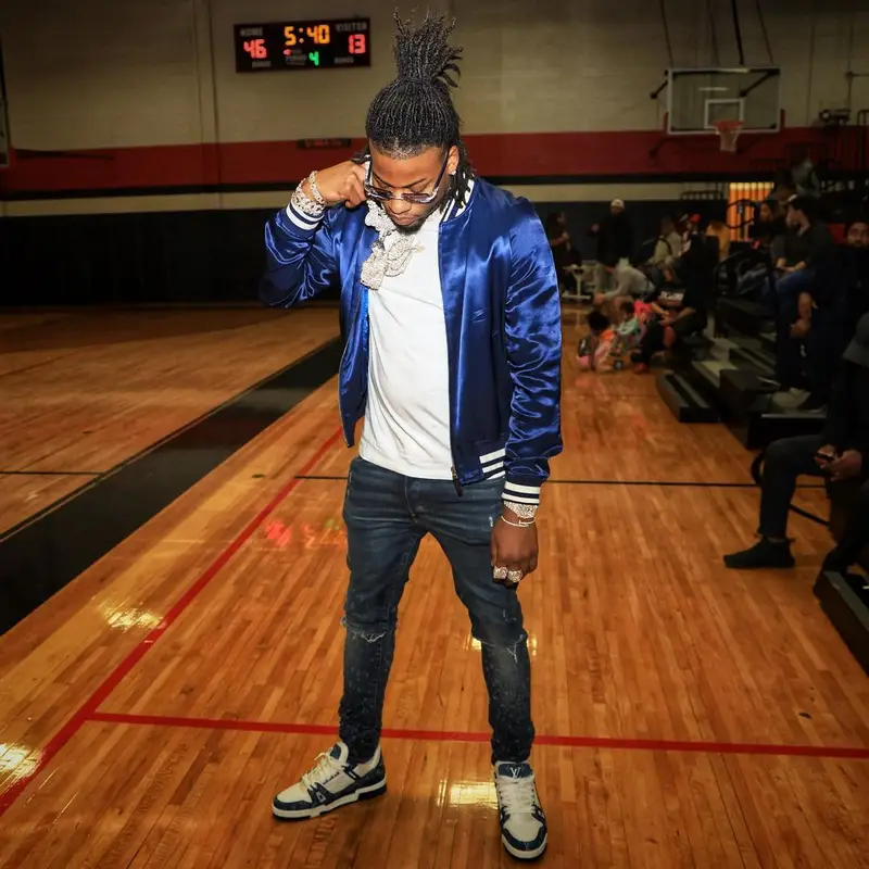 CJ So Cool outfit in Louis Vuitton, Amiri, and Cartier, 2022
