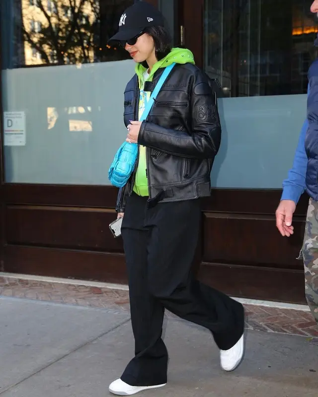 Dua Lipa outfit in Palace, Bottega Veneta, and New Era, 2022