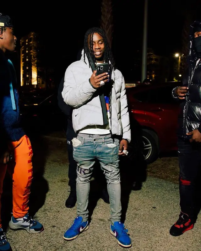 Polo G outfit in Moncler, Heron Preston, and Amiri, 2022