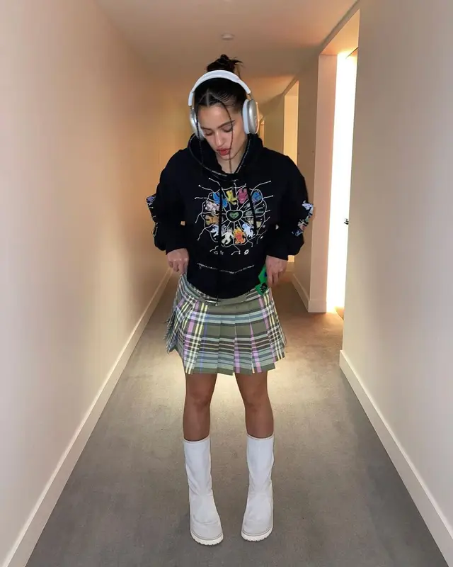 Rosalia outfit in Claire Barrow, Maison Margiela, and Apple, 2022