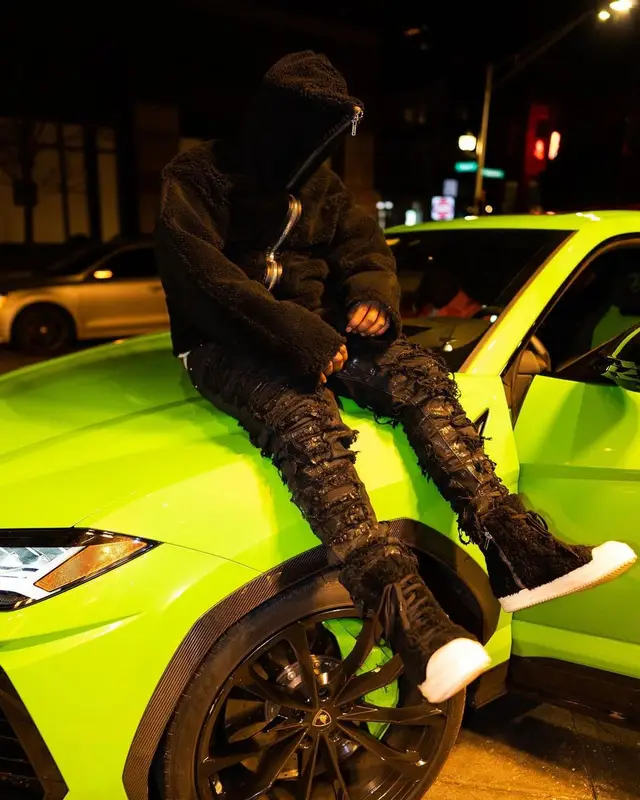 Lil Zay Osama outfit in Rick Owens, 2022