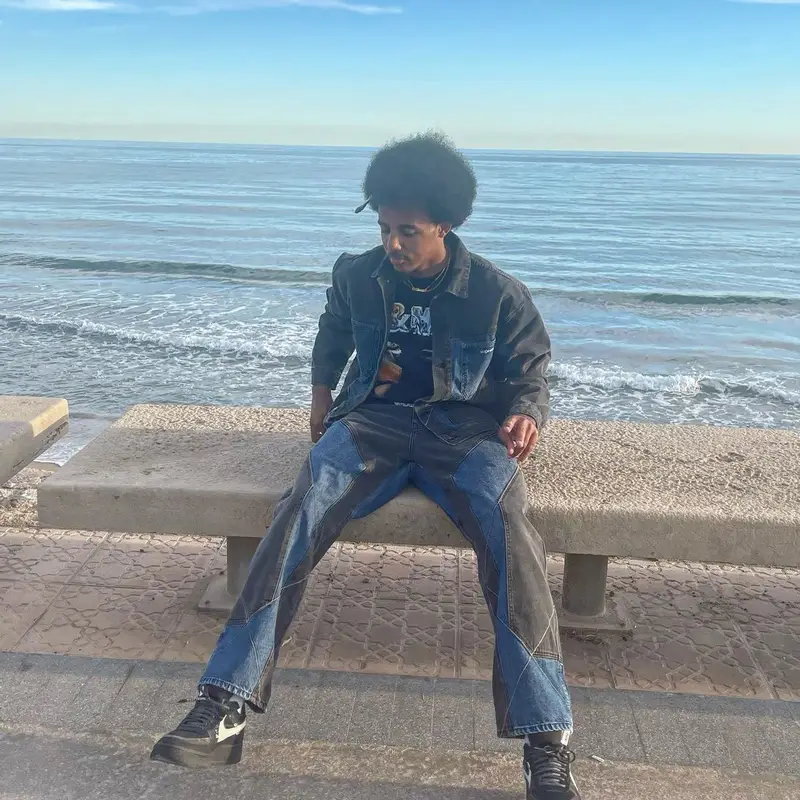 Jules Kounde outfit in Supreme, Oakley, and Golf Wang, 2022