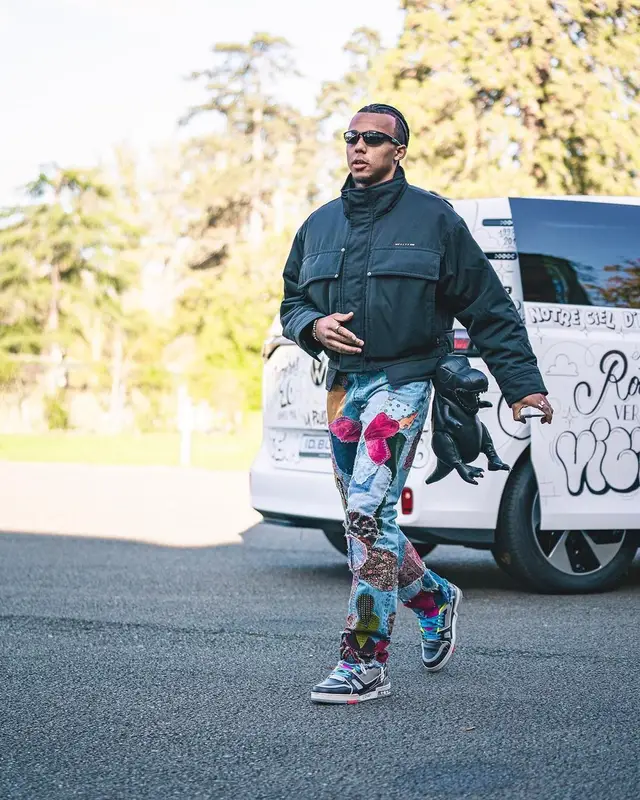 Jules Kounde outfit in 1017 Alyx 9SM, Kapital, and Oakley, 2022