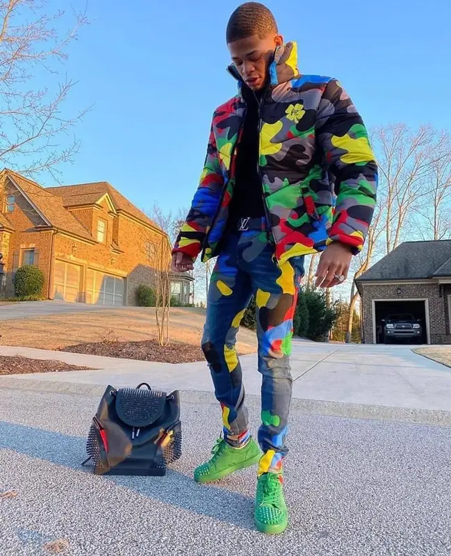 YK Osiris outfit in Filthy Wealth, Christian Louboutin, and Louis Vuitton, 2022