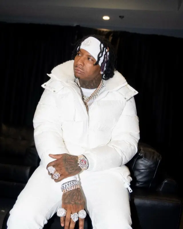 Moneybagg Yo outfit in Amiri, Alexander McQueen, and Moncler, 2022