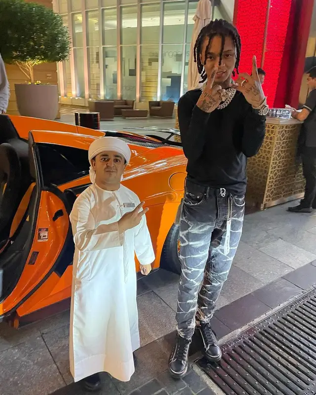 Swae Lee outfit in Purple Brand, Alexander McQueen, and Dior, 2022
