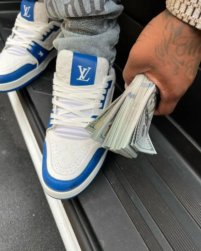 Finesse2tymes outfit in Moncler, Ksubi, and Louis Vuitton, 2022