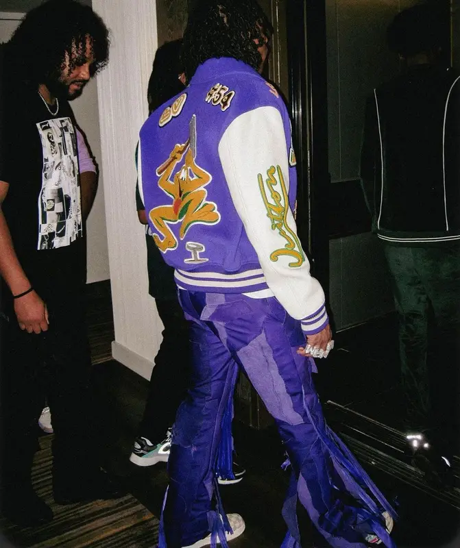 Lil Baby outfit in Louis Vuitton, Mokoo, and Nike, 2022