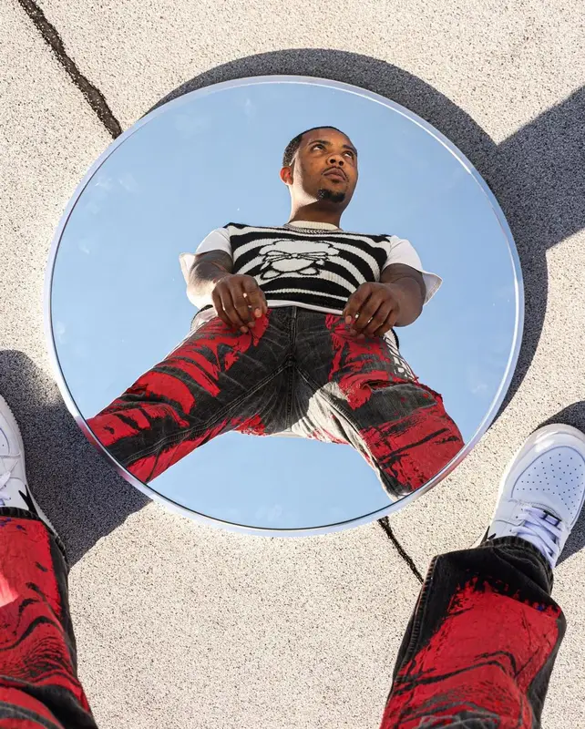 G Herbo outfit in DazeInBlue, Spider Worldwide, and Bape, 2022