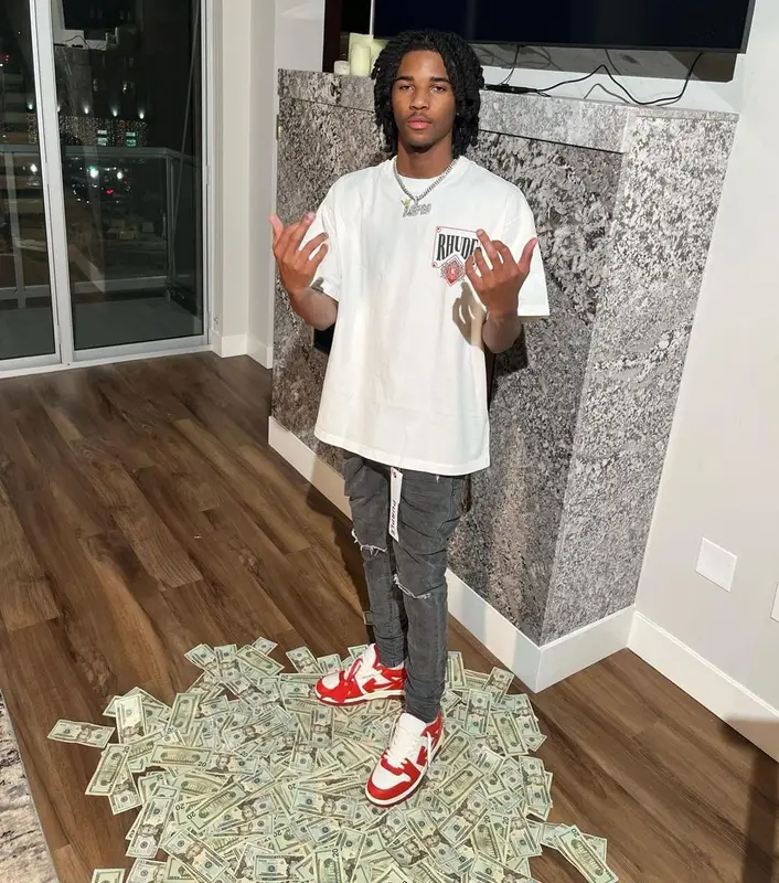 Lil Darius outfit in Rhude, Purple Brand, and Off-White, 2022