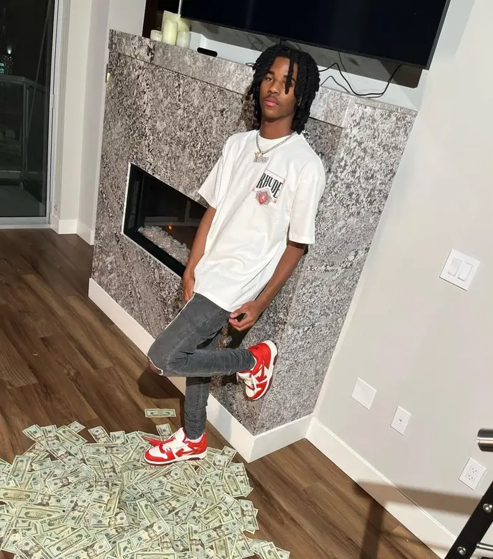 Lil Darius outfit in Rhude, Purple Brand, and Off-White, 2022