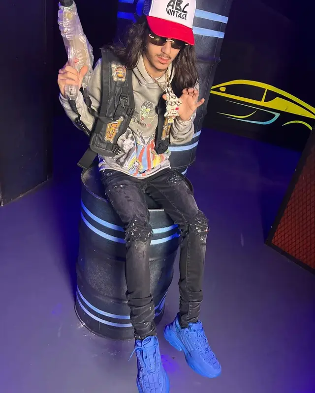 BabyTron outfit in Amiri, Cartier, and ABC Vintage, 2022