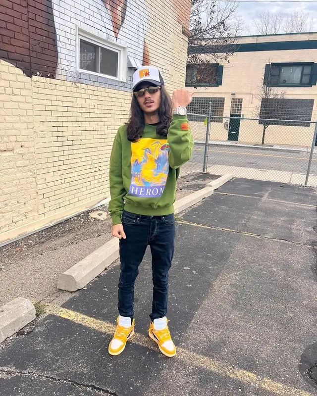 BabyTron outfit in Heron Preston, Cartier, and ABC Vintage, 2022