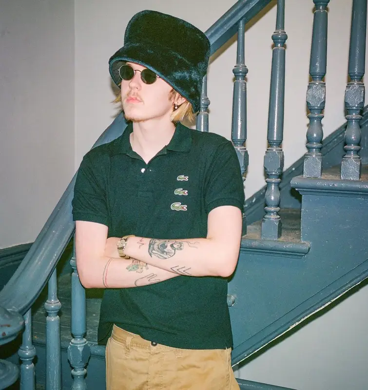 Weiland outfit in Comme Des Garcons, Rolex, and Lacoste, 2022