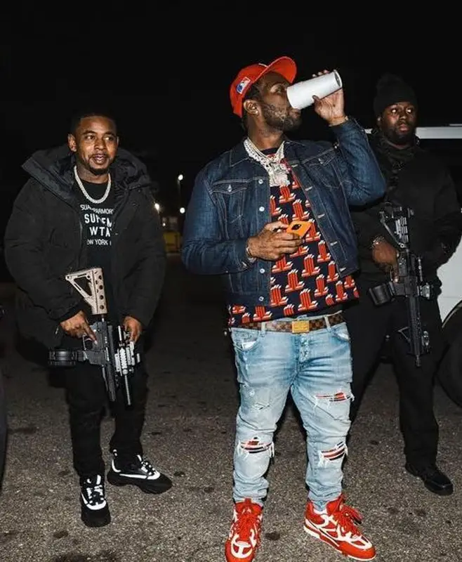 Peezy outfit in Lanvin, Amiri, and Louis Vuitton, 2022