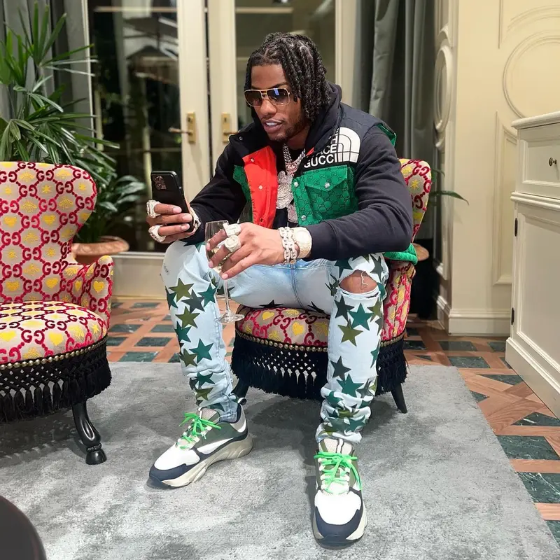 CJ So Cool outfit in Gucci, Louis Vuitton, and The North Face, 2022