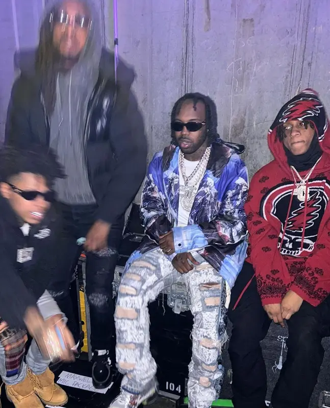 EST Gee outfit in Who Decides War, Balenciaga, and Versace, 2022