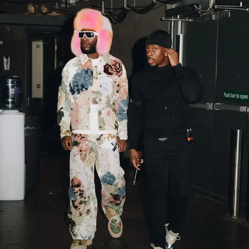 Burna Boy outfit in Louis Vuitton, 2022