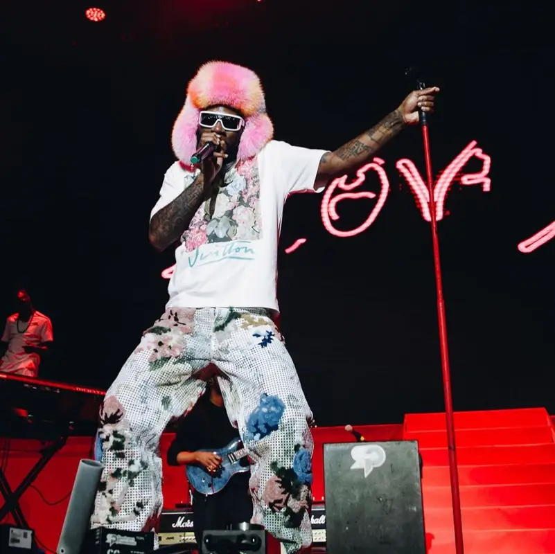 Burna Boy outfit in Louis Vuitton, 2022