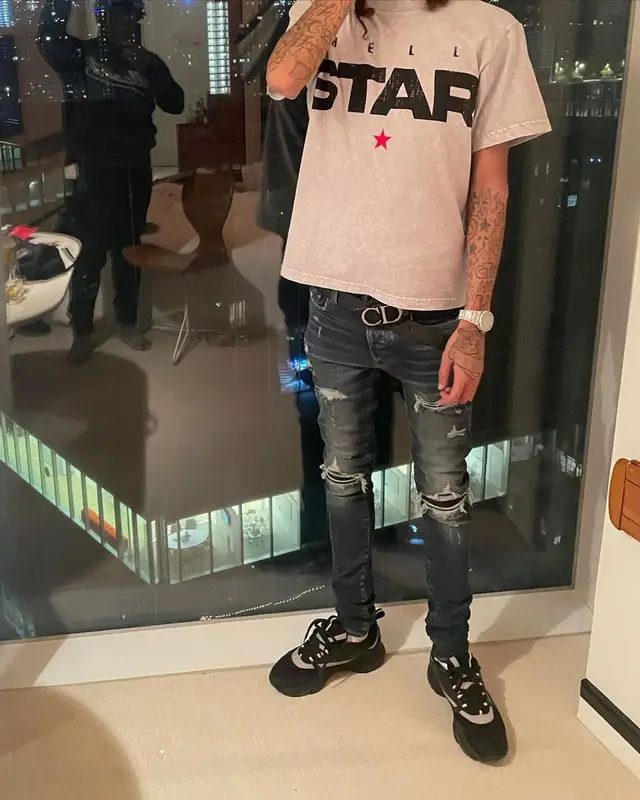 Ot7Quanny outfit in Hellstar, Amiri, and Dior, 2022