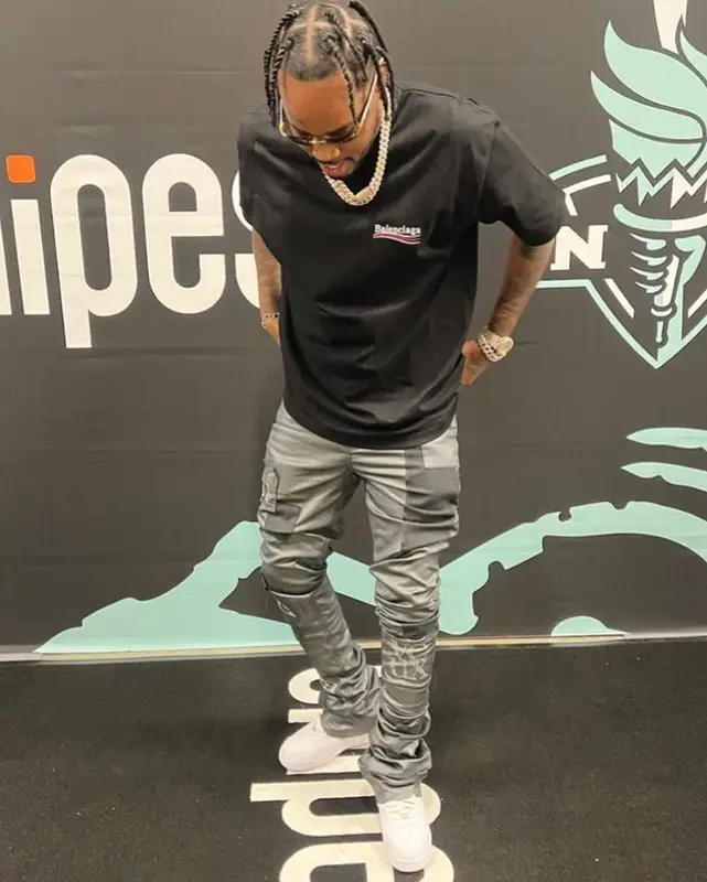 Fivio Foreign outfit in Balenciaga, Nike, and Cartier, 2022