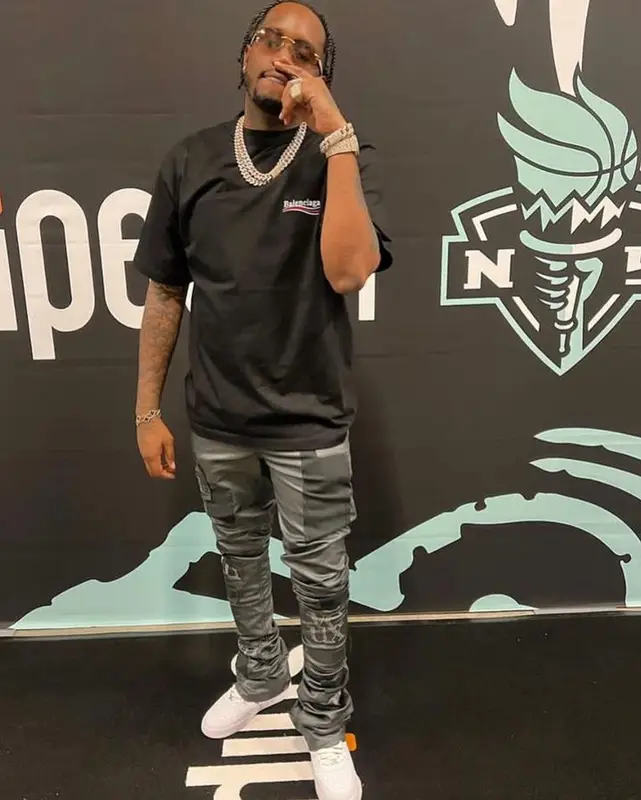 Fivio Foreign outfit in Balenciaga, Nike, and Cartier, 2022