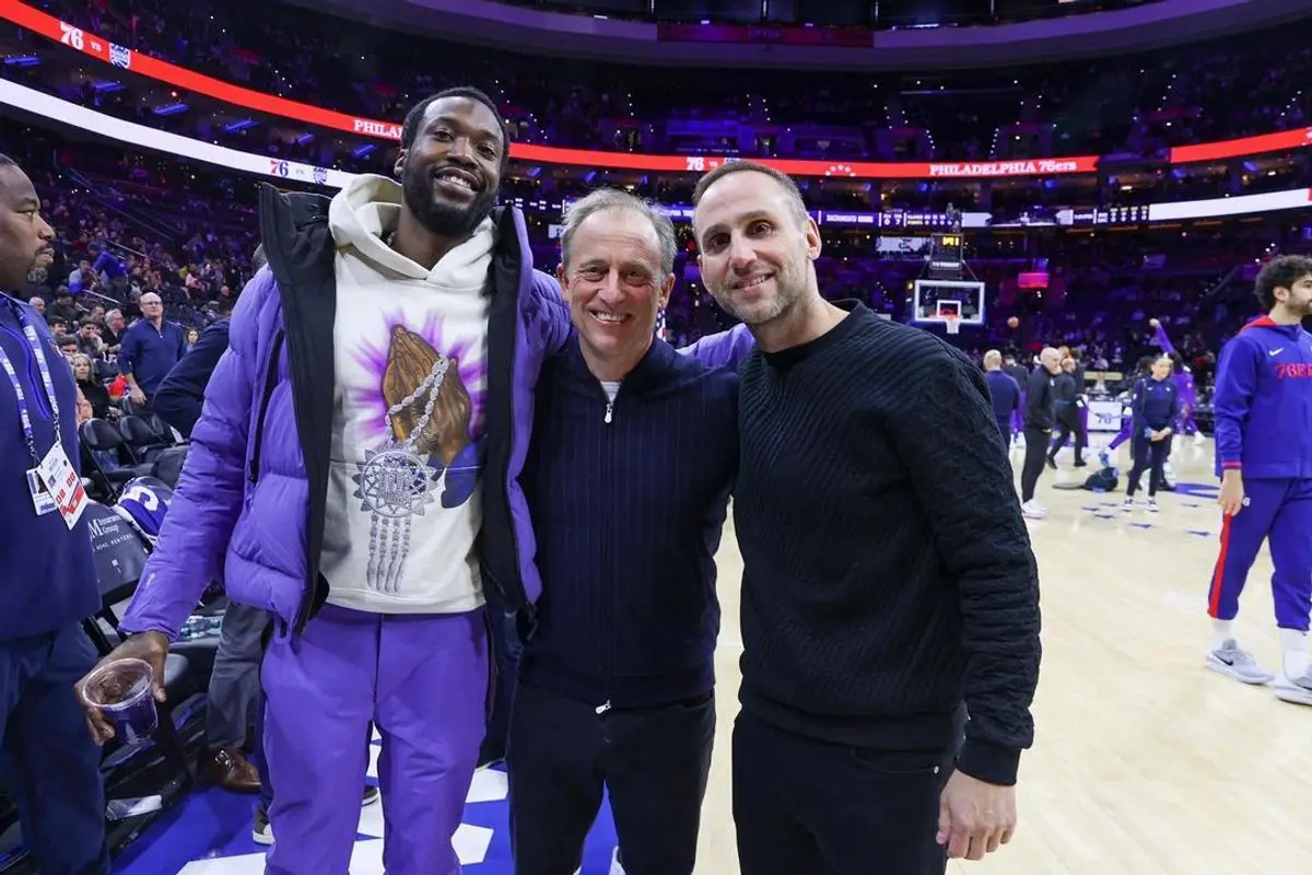 Meek Mill outfit in Dior, Jordan, and Descente, 2022