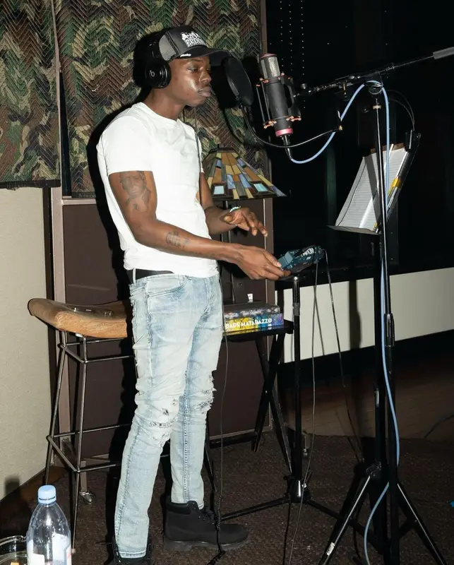 Bobby Shmurda outfit in Ksubi, Timberland, and Prada, 2022