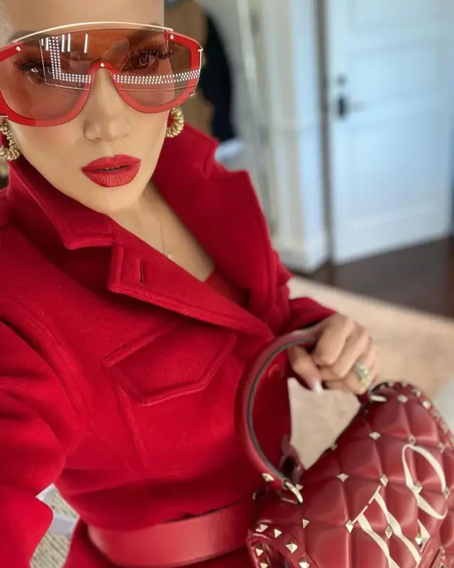 Jennifer Lopez outfit in Valentino Garavani, Amavii, and Jennifer Lopez Merch, 2022